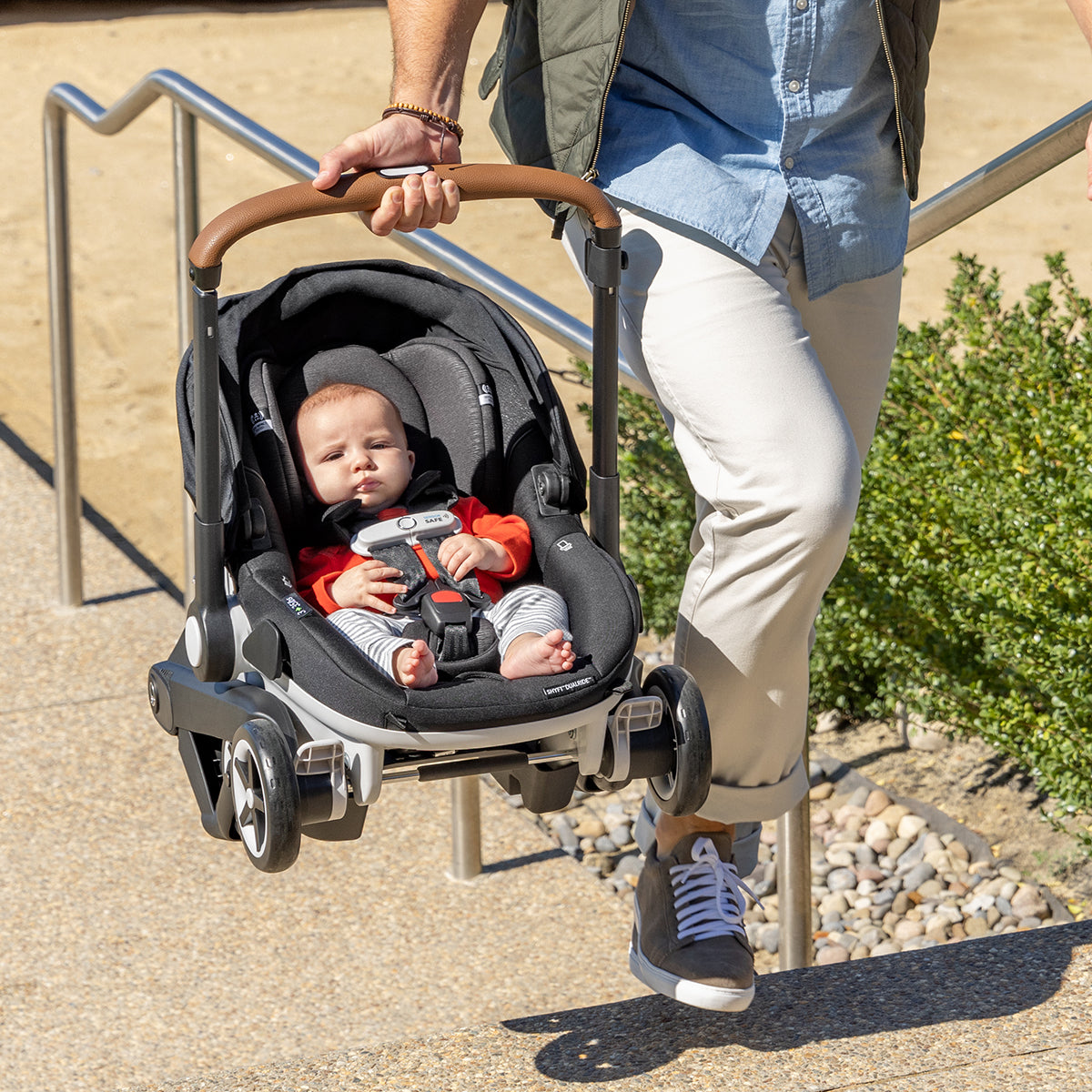 Evenflo GOLD Shyft DualRide Infant Car Seat and Stroller Combo - Opal Pink