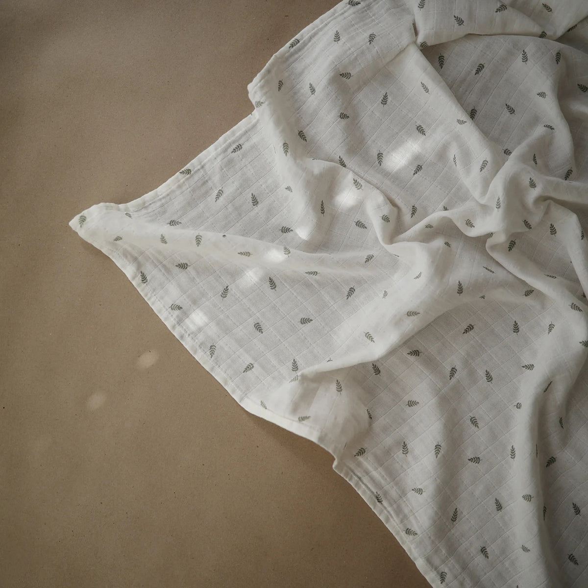 Mushie Organic Cotton Muslin Swaddle Blanket - Leaves