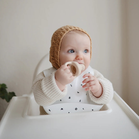 Mushie Silicone Baby Bib - Letters White