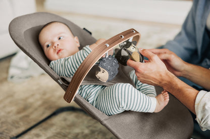 UPPAbaby Mira Bouncer Toy Bar - Forest Fun (Grey / Walnut Wood)